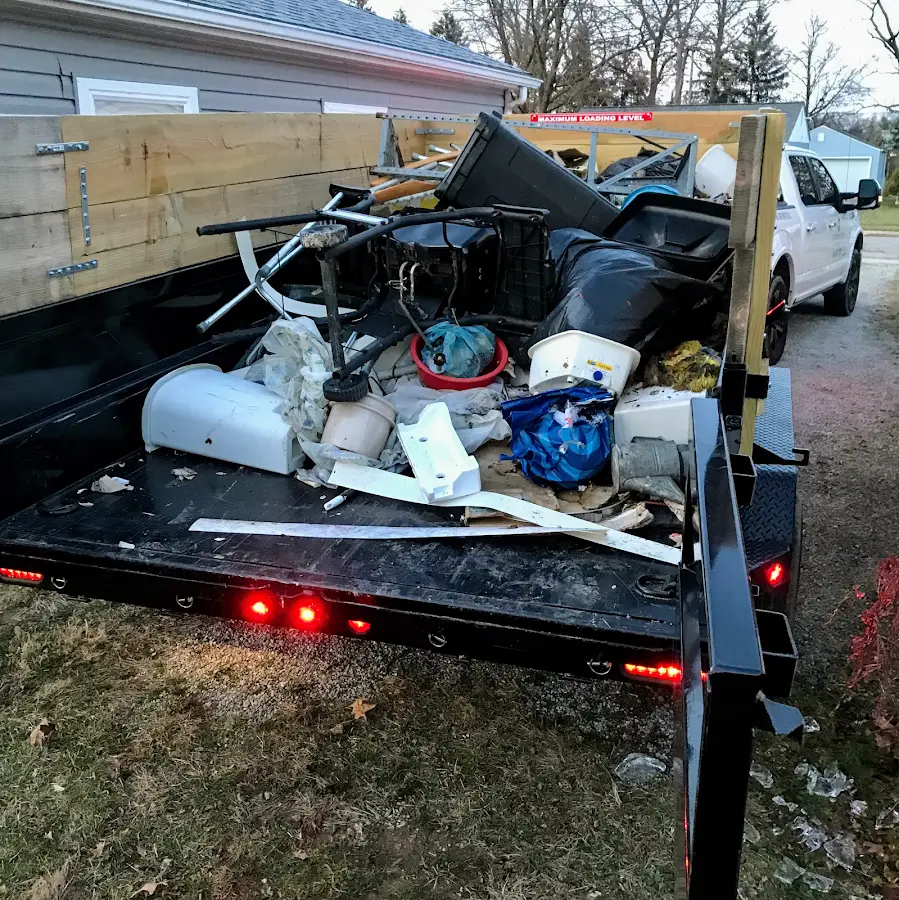 Roll-off dumpster delivered to a residential driveway in Robinwood